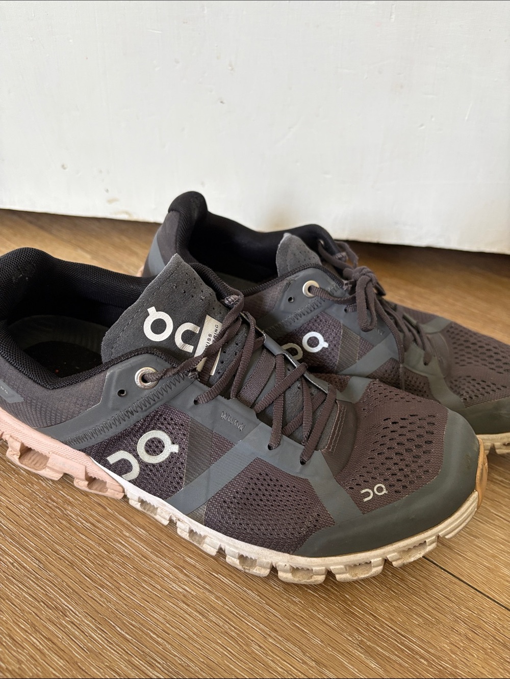 On Running Men's Athletic Shoes in Charcoal with Pink Sole